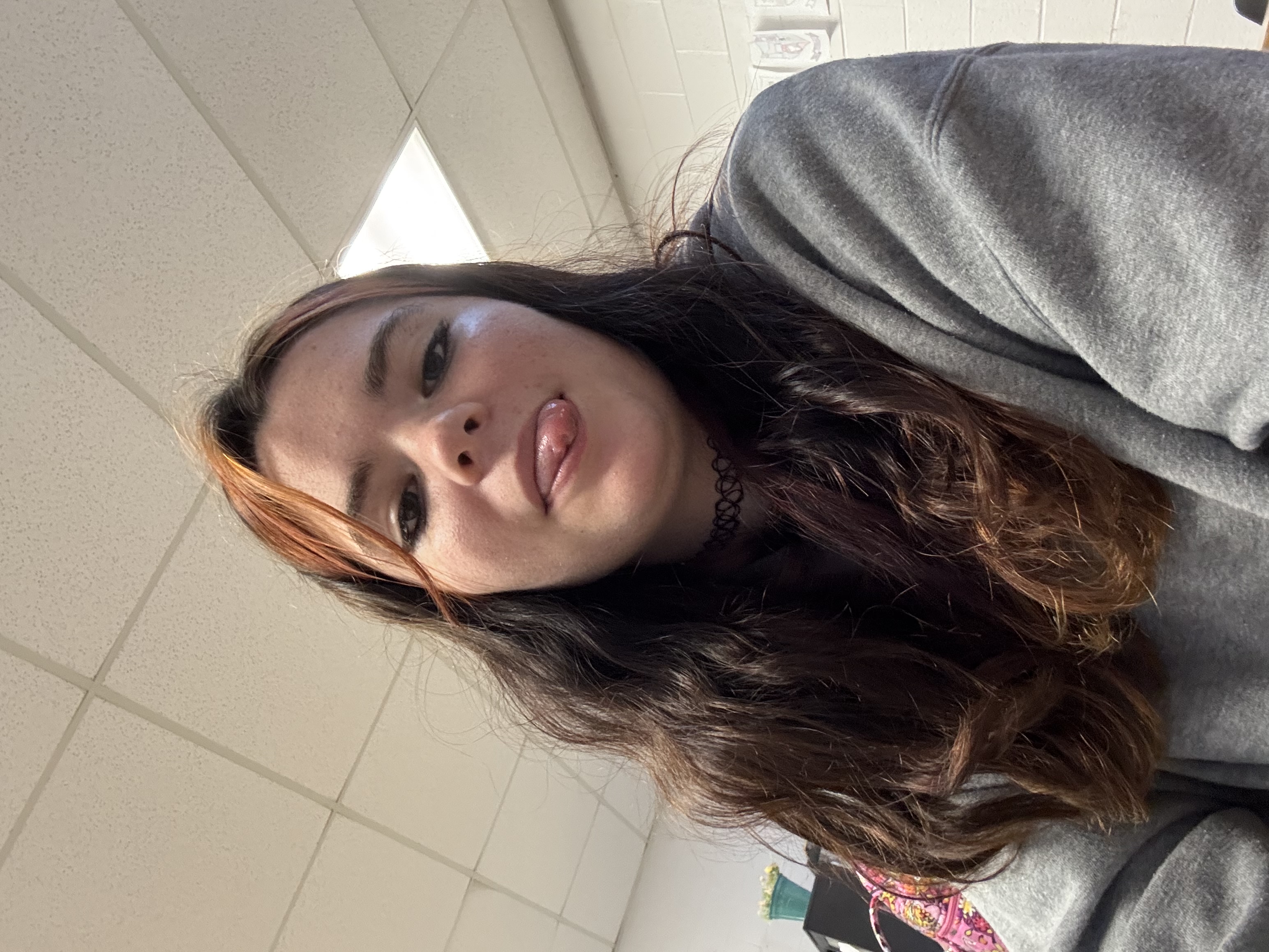 Kyra smiling at the camera